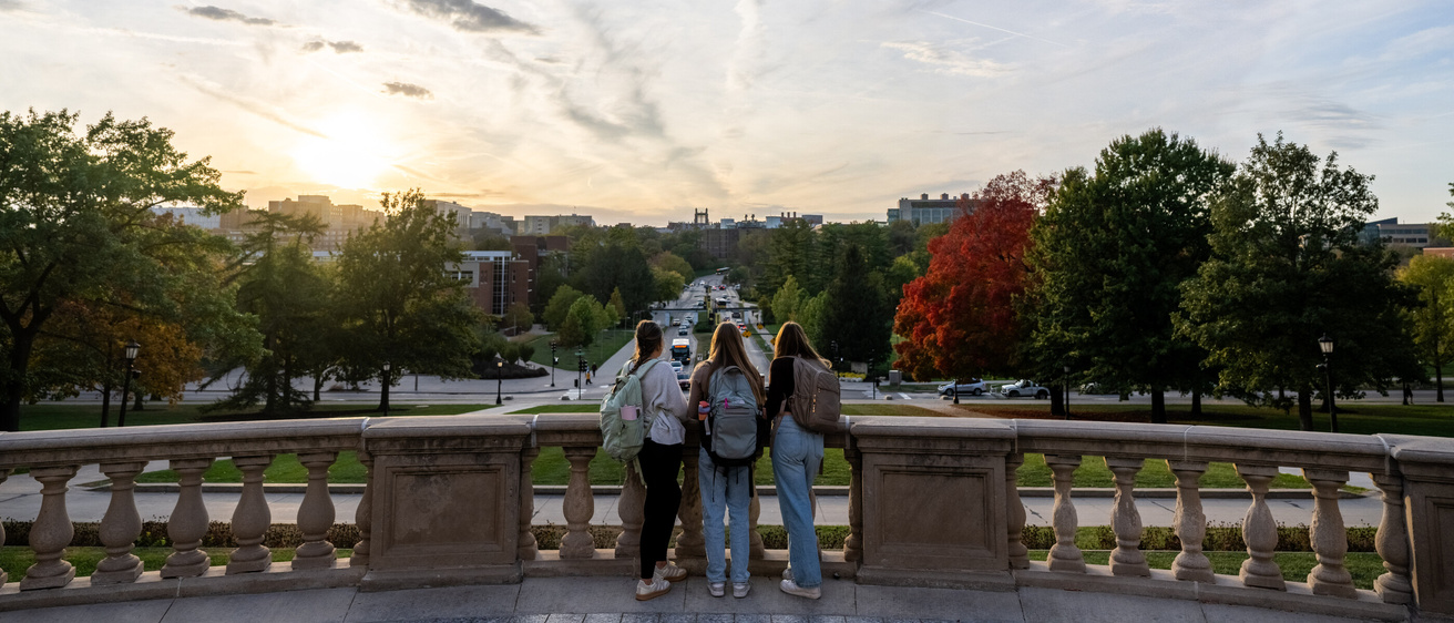 Students at the West Overlook during sunset