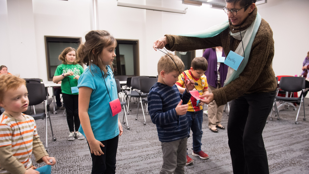 UI Staff working with students in Muscatine Public Library