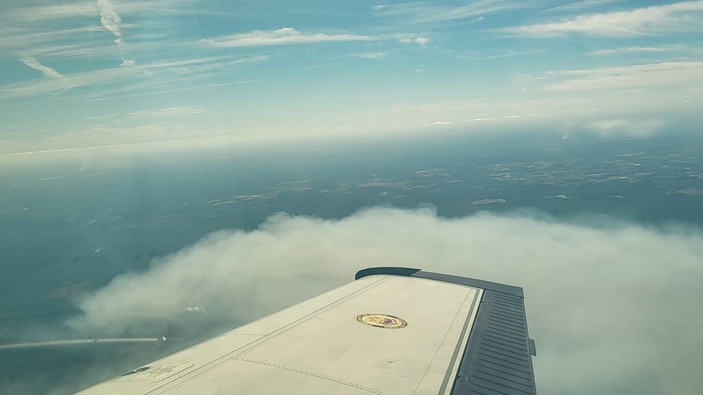 Aerial photo from a plane, showing the sky