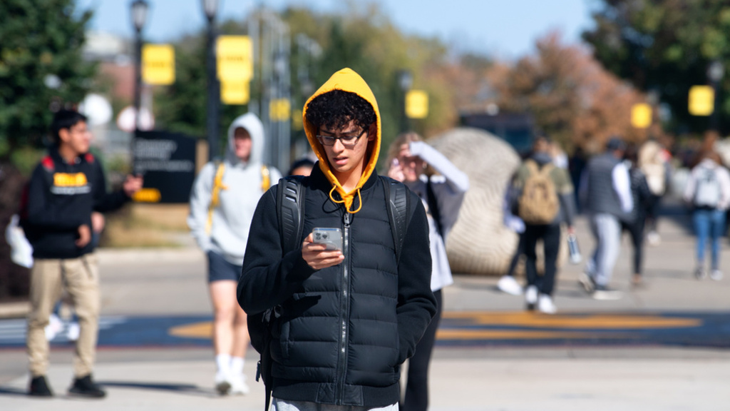 Student checking his phone