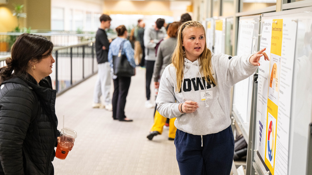 Student presenting at a first-year poster session