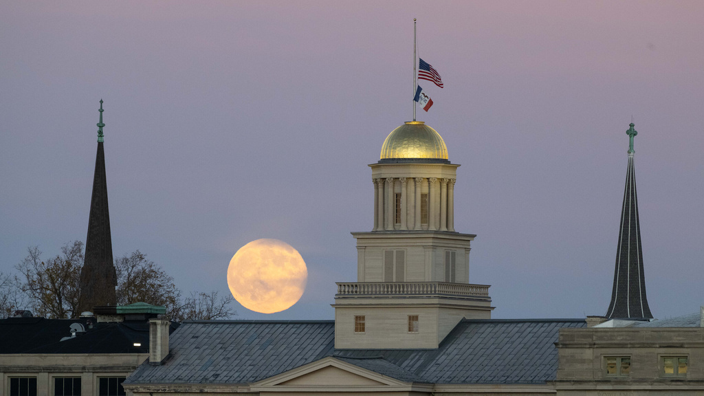 Moon rising behind the Old Capitol building