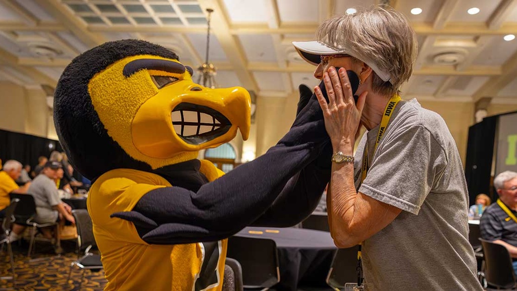 Herky interacting with participants at the "Grandparents University" program